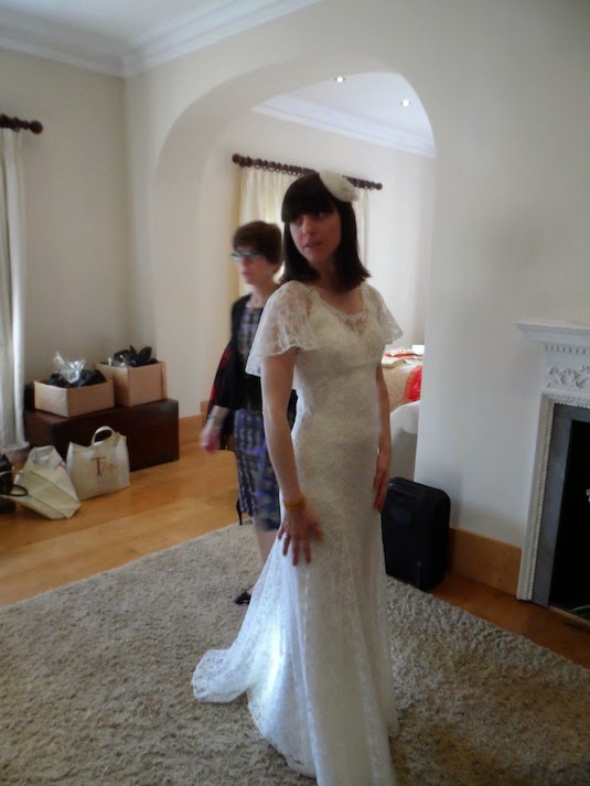 Vintage Bride Rachel getting ready for the ceremony in gorgeous 1903s wedding dress