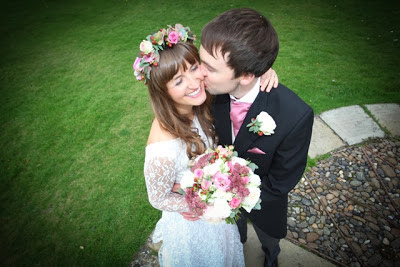 Real vintage bride Olivia in 1960s lace vintage wedding dress, Nick kisses Olivia