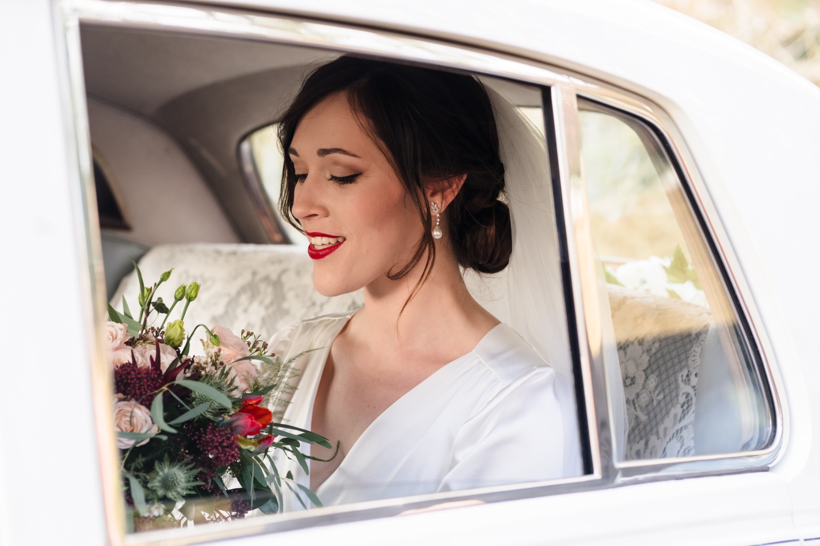 Sophie wearing 1940s style vintage wedding dress