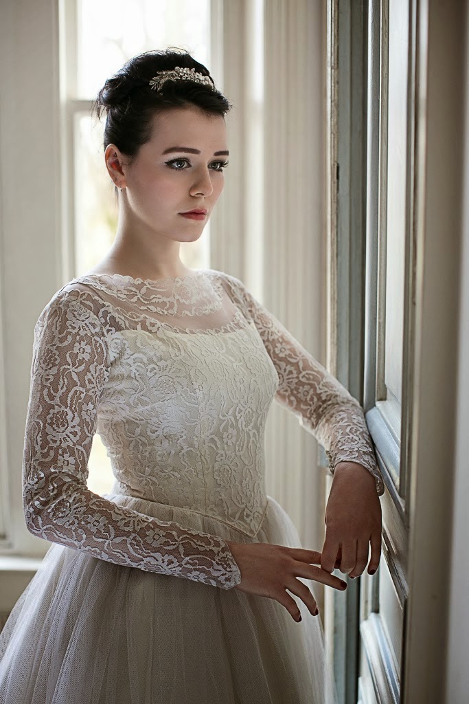 Long lace sleeves, and neat fitted lace bodice